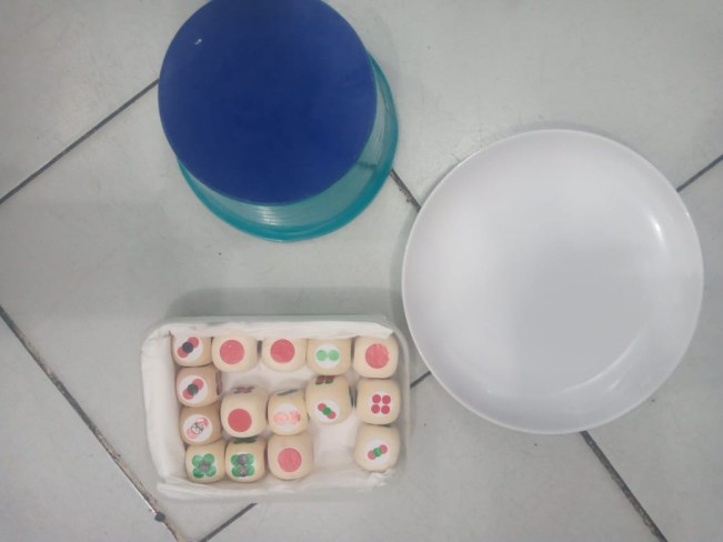 Judi dadu kopyok turut diamankan. [Istimewa]